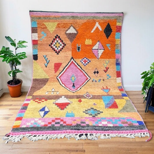 Full view of a handwoven multi-diamond Beni Ourain Moroccan rug with a vibrant color palette and unique geometric motifs.