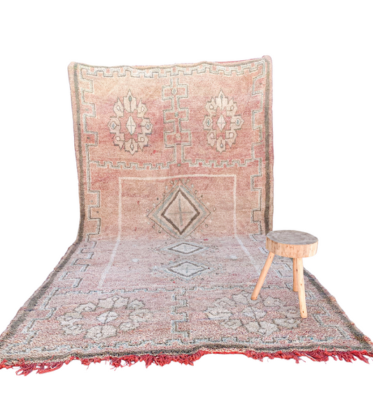 Full view of a light framed handwoven wool Boujaad Moroccan rug.